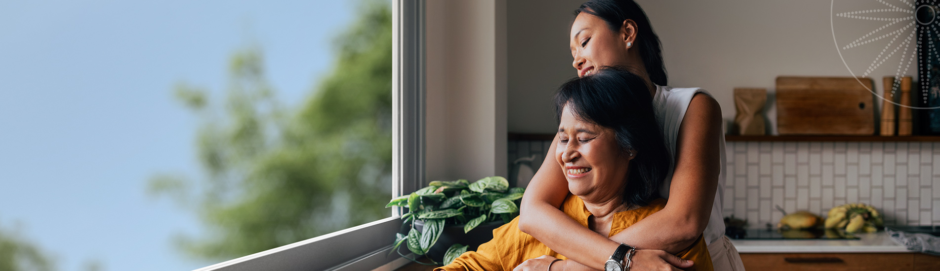 adult daughter hugging her mother both looking away into the distance